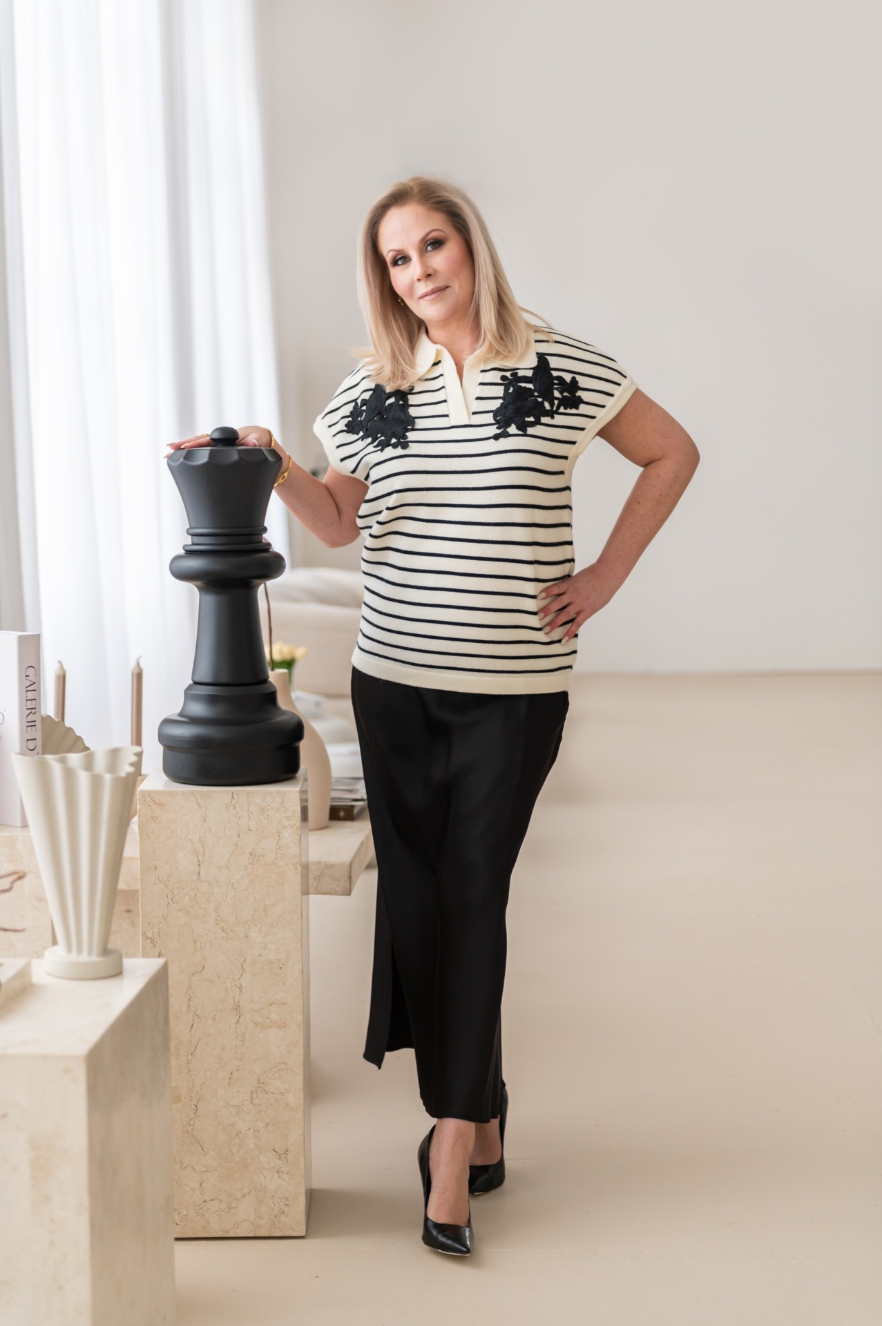 Dawn in striped knit, chess piece