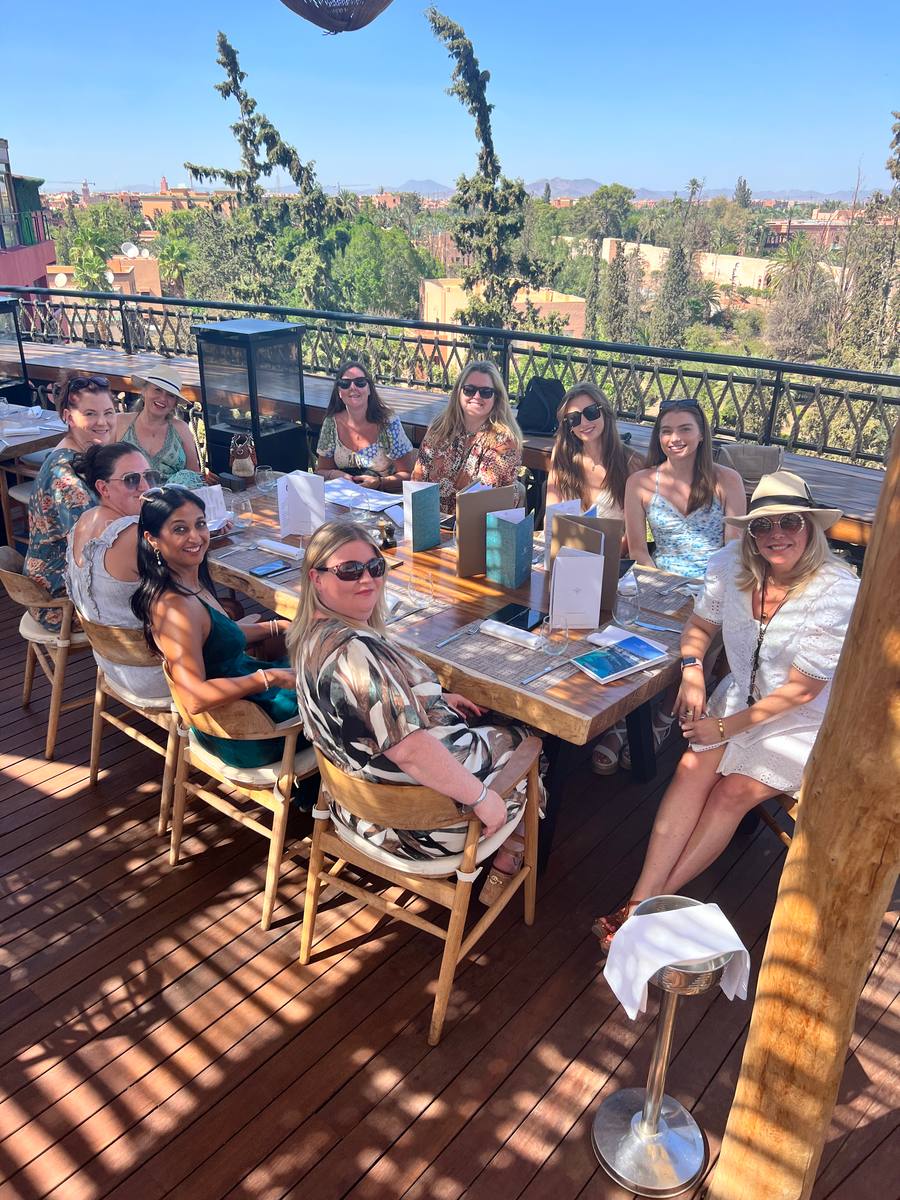 Female founders at a rooftop retreat lunch in Marrakech