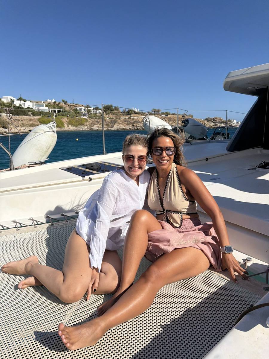Two founders relaxing on deck during the boat day