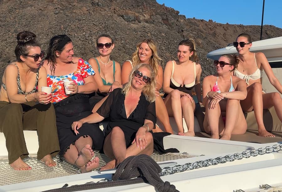 Female founders on a private catamaran during a retreat